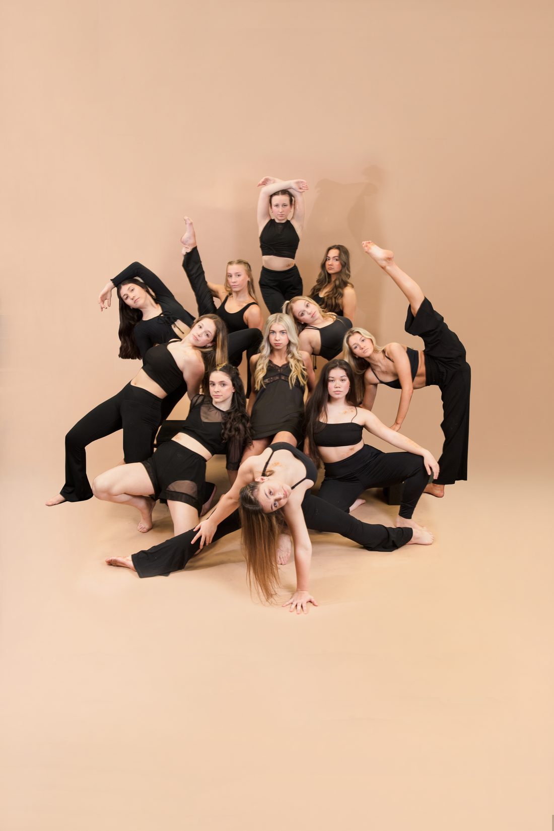 Centre Pointe dancers posed together in the studio